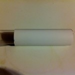 Roll up acetate and slip into PVC hold leaving one end flush.